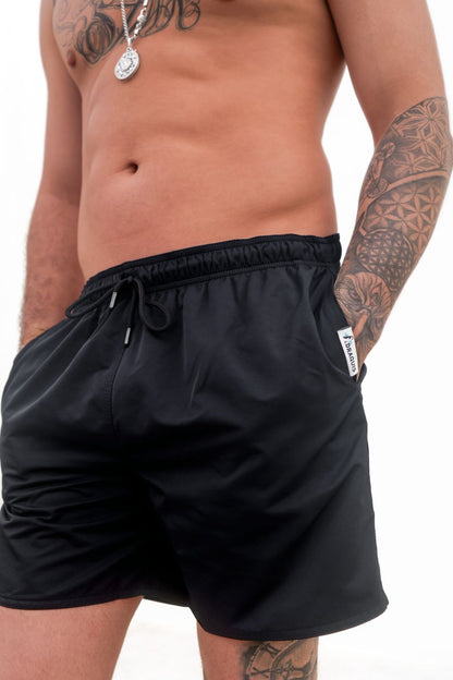 The Cruiser black Swim trunks from the front a close up